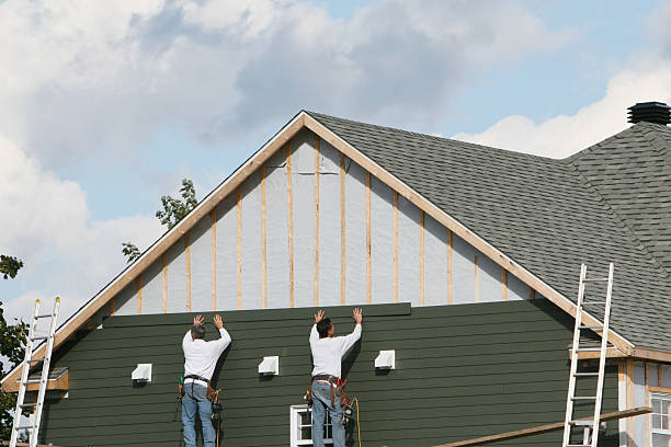 Professional Emergency Siding Repair technician working in Georgetown, MA